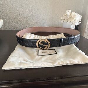 Gucci Embossed Black Leather Belt with Gold Emblem